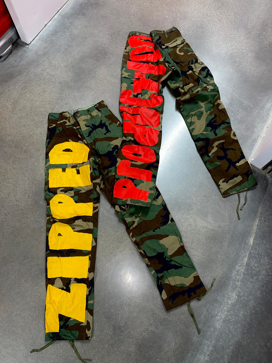 CAMO ZIPPED PRODUCTION PANTS (UNISEX)